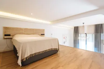 Cama o camas de una habitación en Loft Patricia Nervión