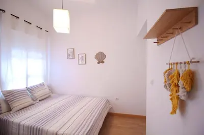 Cama o camas de una habitación en Sevilla centro- Sol - Acogedor y luminoso