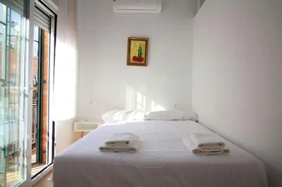 Cama o camas de una habitación en Sevilla centro - Carrión Mejías
