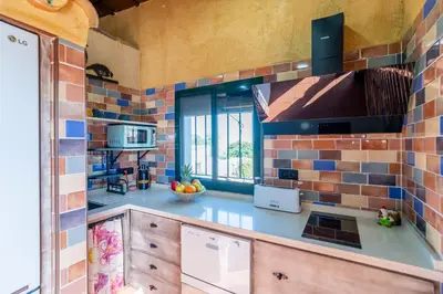 Una cocina o zona de cocina en Casa Rural Carmo