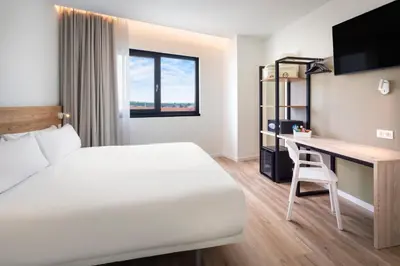 Cama o camas de una habitación en B&B HOTEL Écija