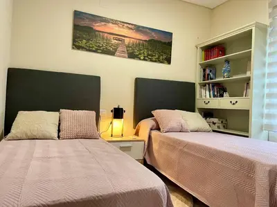 Cama o camas de una habitación en Geysotur Cordobán Torre