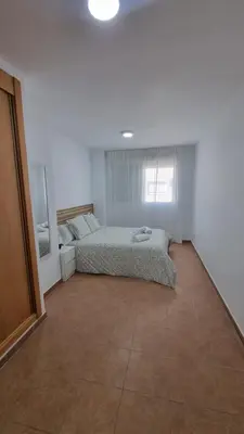 Cama o camas de una habitación en Moderno Apartamento 3 dormitorios y piscina