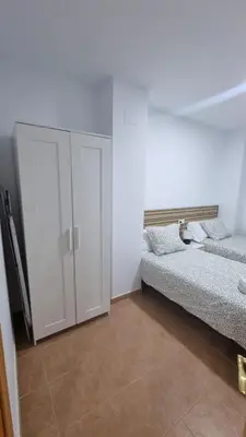 Cama o camas de una habitación en Moderno Apartamento 3 dormitorios y piscina