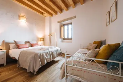 Cama o camas de una habitación en Preciosa Casa Renovada Centro Histórico 11 personas