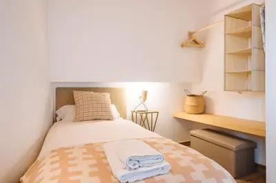 Cama o camas de una habitación en Preciosa Casa Renovada Centro Histórico 11 personas