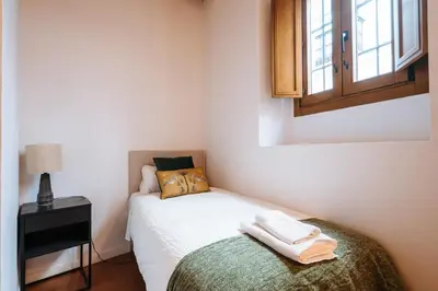 Cama o camas de una habitación en Preciosa Casa Renovada Centro Histórico 11 personas