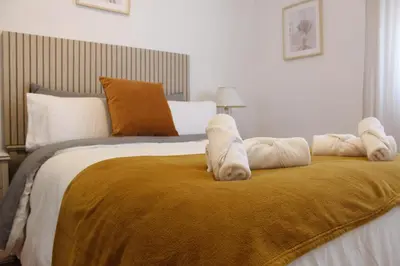 Cama o camas de una habitación en Tkm home Amplió y familiar, terraza privada
