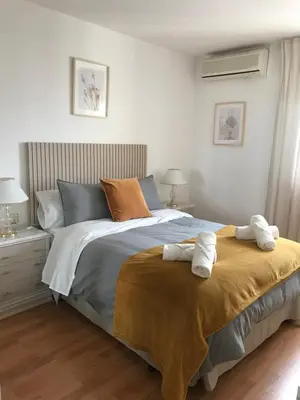 Cama o camas de una habitación en Tkm home Amplió y familiar, terraza privada