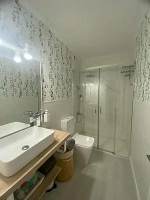 Un baño de Tkm home Amplió y familiar, terraza privada