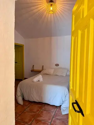 Cama o camas de una habitación en El Cielo, Cortijo en el corazón de las montañas