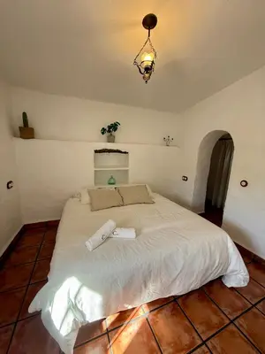Cama o camas de una habitación en El Cielo, Cortijo en el corazón de las montañas