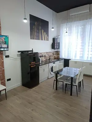 Una cocina o zona de cocina en Apartamento Mezquita Catedral, Saqunda 2