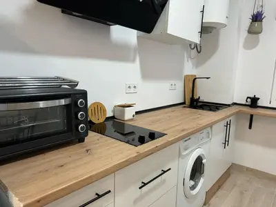 Una cocina o zona de cocina en Apartamento Almagro López