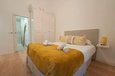 Cama o camas de una habitación en Apartamento a estrenar junto al centro de la ciudad