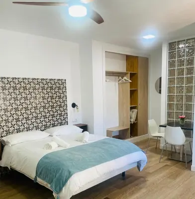 Cama o camas de una habitación en Patio de Los Barberos 3