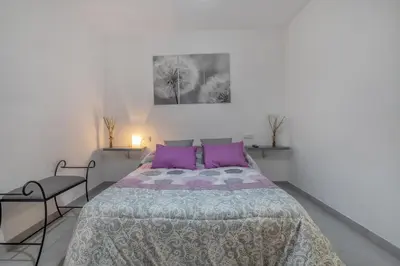 Cama o camas de una habitación en Jade Central Apto & Two Patios