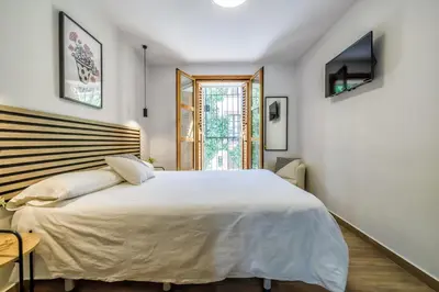 Cama o camas de una habitación en Casa Los Naranjos - Terraza en el Casco Histórico