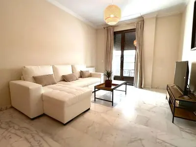 Una televisión o centro de entretenimiento en Apartamento en PLENO CENTRO con APARCAMIENTO opcional