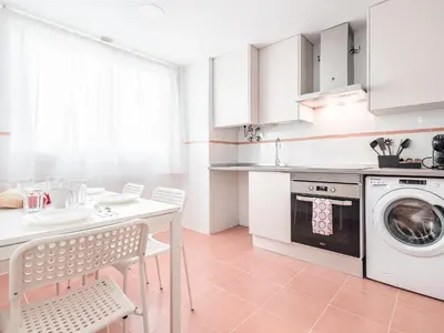 Una cocina o zona de cocina en Apt buenas calidades La Algaba Bazan