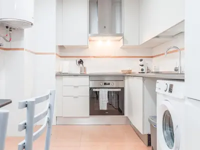 Una cocina o zona de cocina en Apt buenas calidades La Algaba Bazan