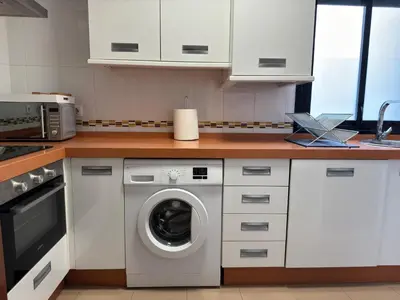 Una cocina o zona de cocina en Dúplex céntrico con terraza y parking gratuito