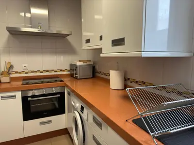 Una cocina o zona de cocina en Dúplex céntrico con terraza y parking gratuito