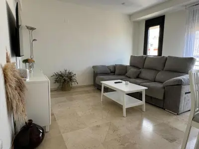 Zona de estar de Dúplex céntrico con terraza y parking gratuito