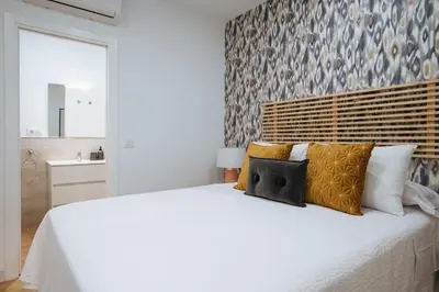 Cama o camas de una habitación en Wish Suite Miraflores de Sevilla