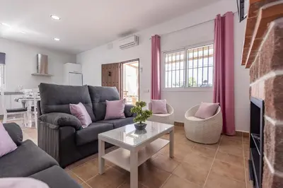 Zona de estar de Casa Rural Lola - Lantejuela