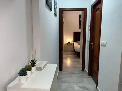 Cama o camas de una habitación en RgHOST-Apartamento La Palma en Casco Histórico