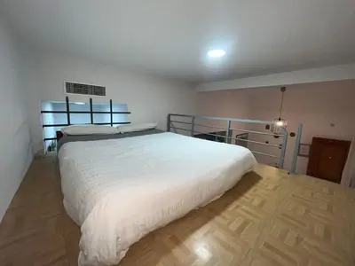 Cama o camas de una habitación en RgHOST-Apartamento La Palma en Casco Histórico