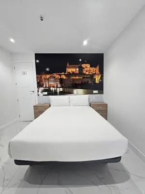 Cama o camas de una habitación en Nueva PENSION CIBELES