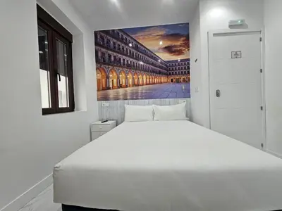 Cama o camas de una habitación en Nueva PENSION CIBELES