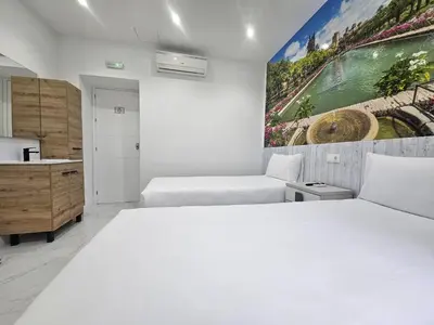 Cama o camas de una habitación en Nueva PENSION CIBELES
