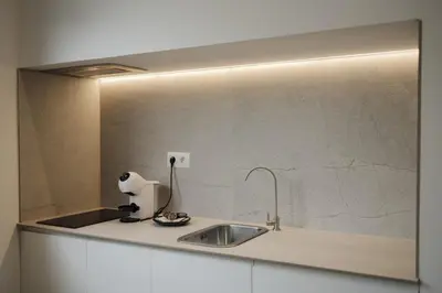 Una cocina o zona de cocina en PALOMA SUITES