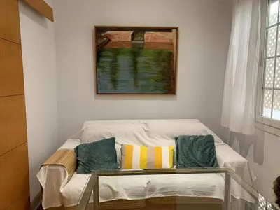 Cama o camas de una habitación en Bonito, tranquilo y fresco apartamento en Nervión.