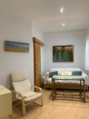 Zona de estar de Bonito, tranquilo y fresco apartamento en Nervión.
