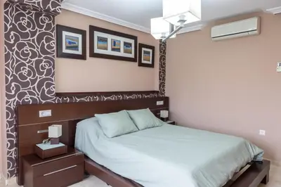 Cama o camas de una habitación en Villa Rural Las Lomas