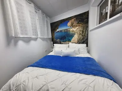 Cama o camas de una habitación en La Flor del Naranjo