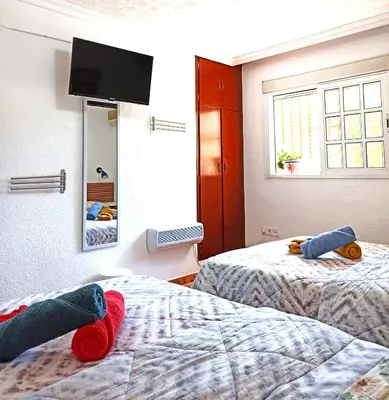 Cama o camas de una habitación en El Azahar