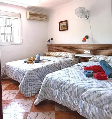 Cama o camas de una habitación en El Azahar