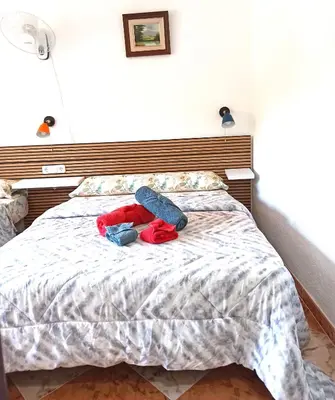 Cama o camas de una habitación en El Azahar