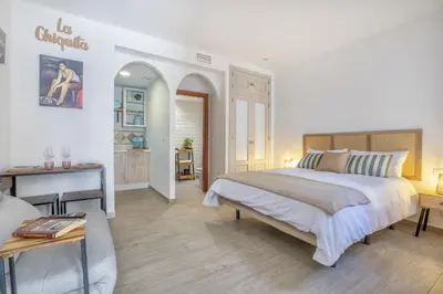 Cama o camas de una habitación en El rincón de la Chiquita & Parking