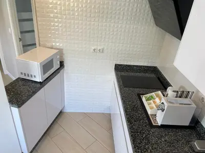 Una cocina o zona de cocina en Ritual Sevilla, Fedriani