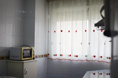 Una televisión o centro de entretenimiento en Hospedium DLJ Arjona Centro I