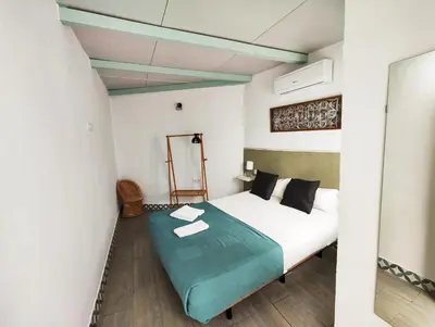 Cama o camas de una habitación en Apartamento PUERTA DE CÓRDOBA