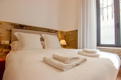 Cama o camas de una habitación en RentalSevilla Lumbreras I