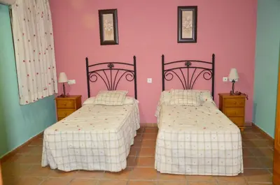 Cama o camas de una habitación en Hostal Restaurante El Parador