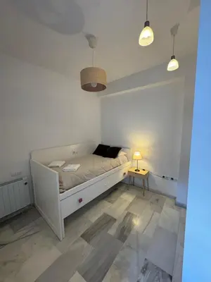 Cama o camas de una habitación en Califal Palma